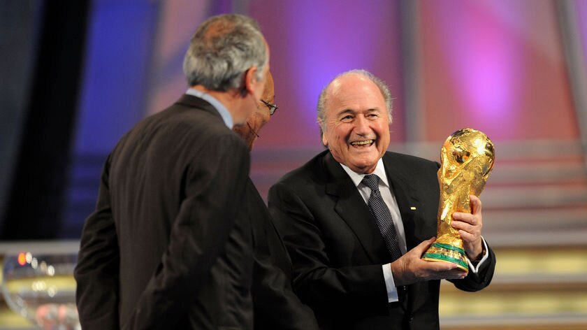 Blatter holds World Cup at draw