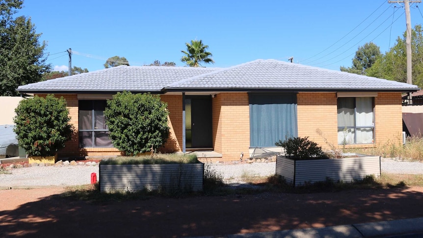 A house in a suburban street.