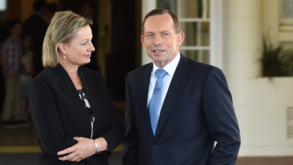 Prime Minister Tony Abbott poses for a picture with new Health Minister Sussan Ley after a ministerial swearing-in.