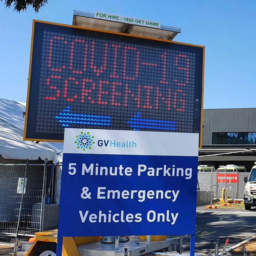 A big electronic sign at Shepparton Hospital pointing to the COVID testing clinic.