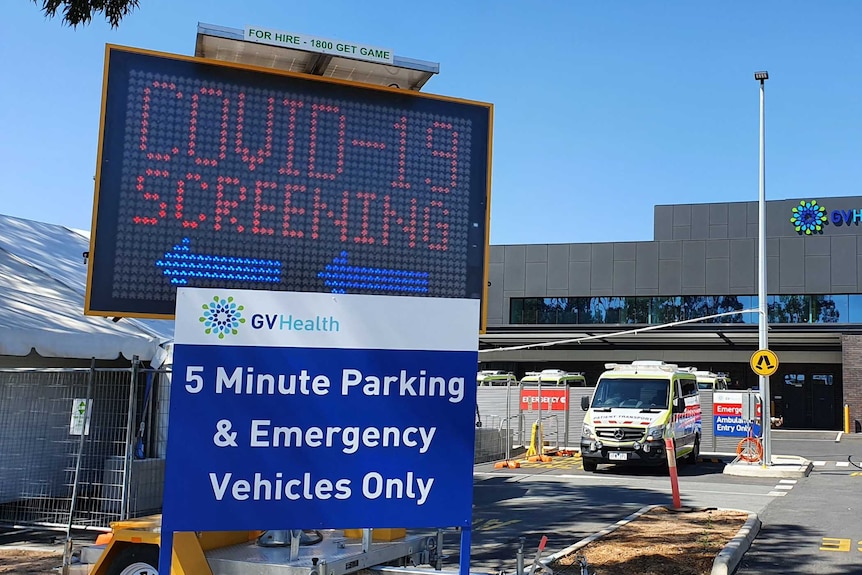 A big electronic sign at Shepparton Hospital pointing to the COVID testing clinic.