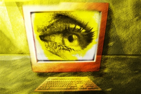 Creative: A human eye appears on a computer monitor. (Thinkstock/Photodisc: Hannah Gal)