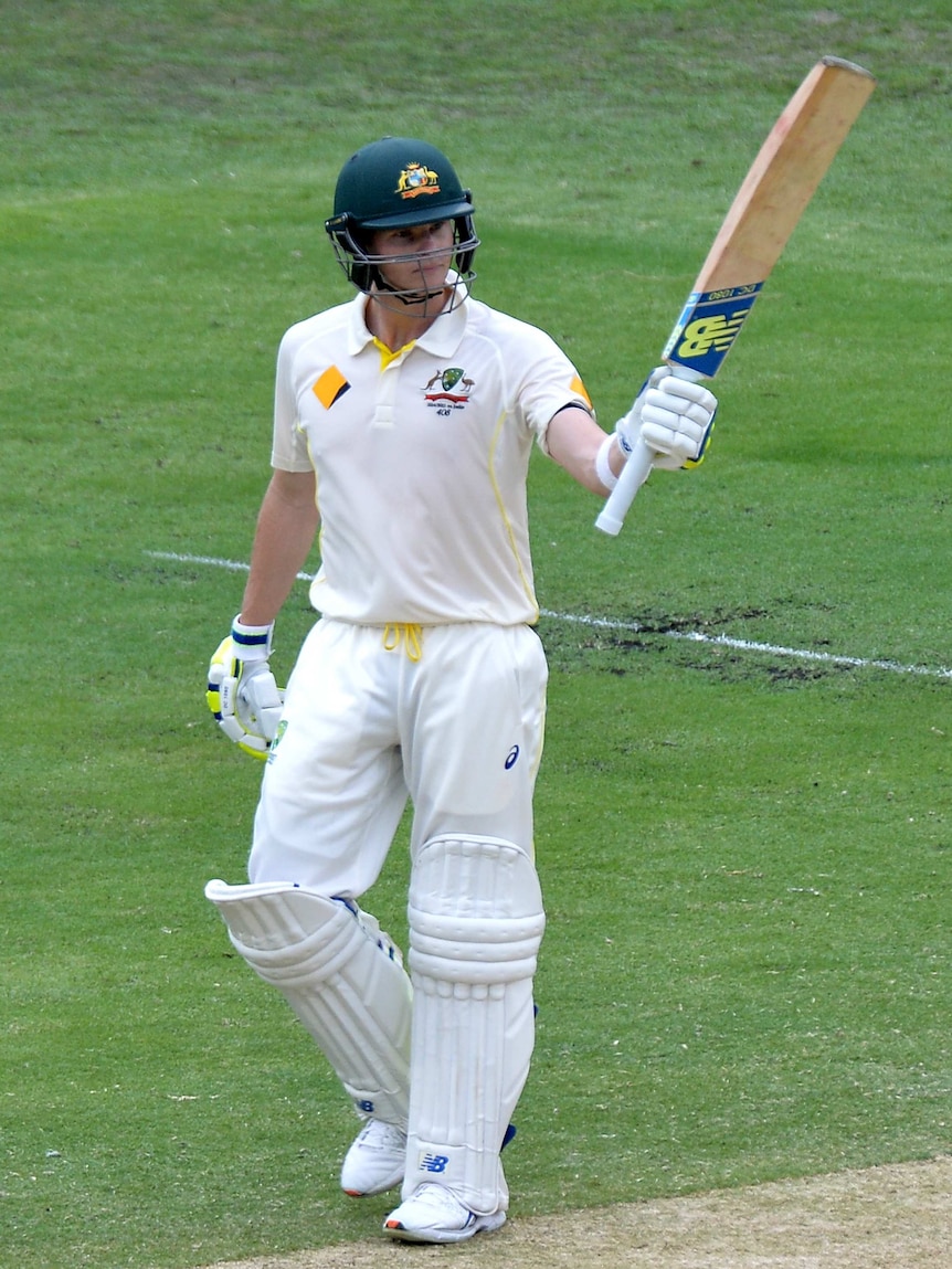 Steve Smith of Australia celebrates scoring a half century during day two of the 2nd Test match between Australia and India at The Gabba