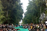 Opposition supporters march silently through Tehran