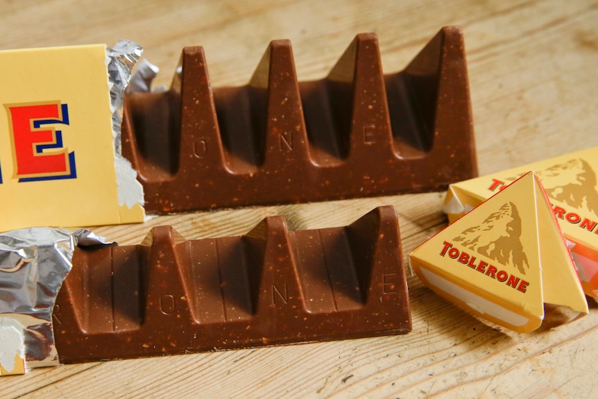 Two bars of the Toblerone Swiss chocolate are shown.