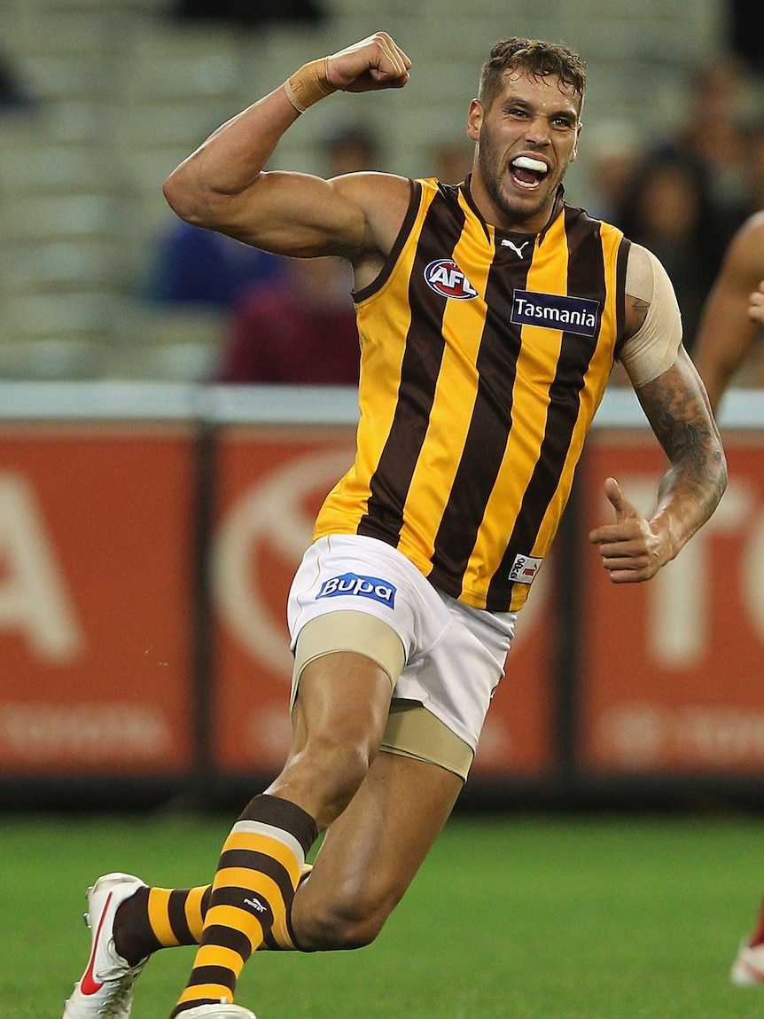 On song ... Lance Franklin shows his joy after kicking one of his goals