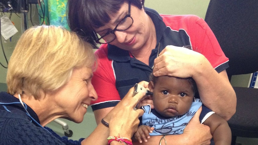 RFDS doctor examines a baby