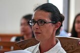 Close up of Sara Connor wearing glasses during her court appearance in Bali.