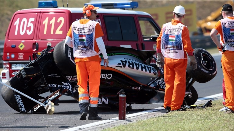 Sergio Perez's flipped car