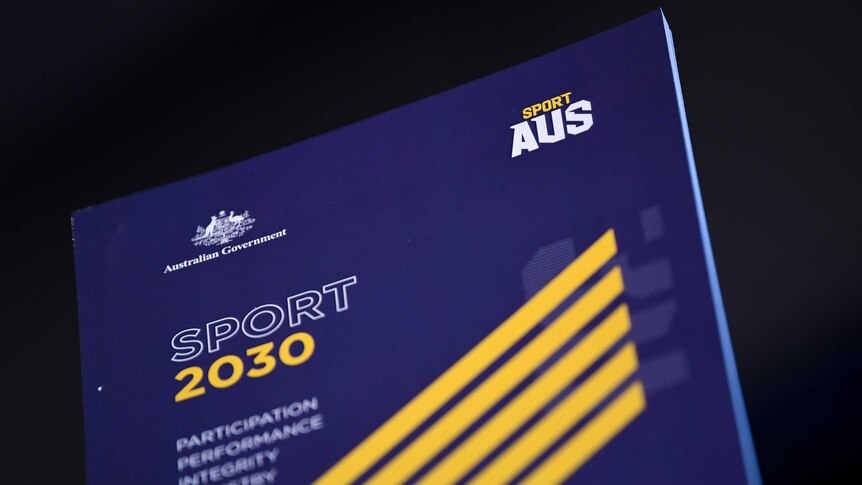 A copy of the 'SPORT 2030' report is seen at the National Press Club in Canberra on August 1, 2018.