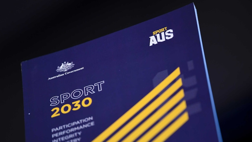 A copy of the 'SPORT 2030' report is seen at the National Press Club in Canberra on August 1, 2018.