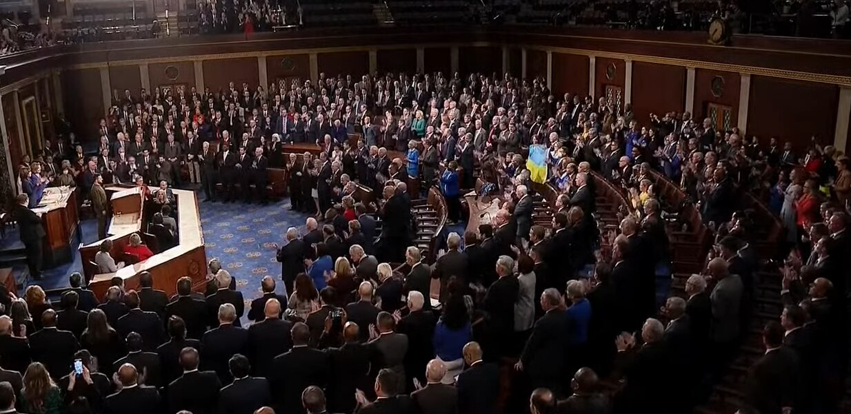 US congress interior with people clapping