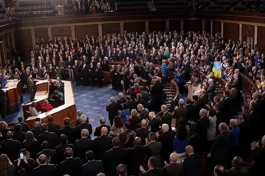 US congress interior with people clapping