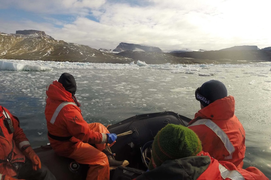 Researchers on inflatable boat