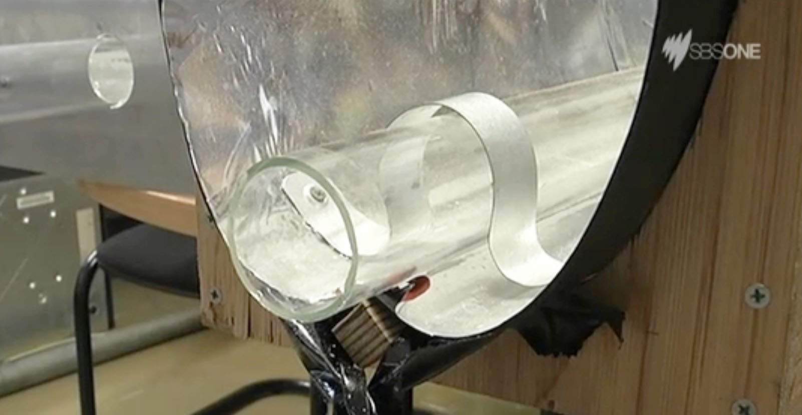 sustainable uses for empty chip packets - parabolic reflector for water purification