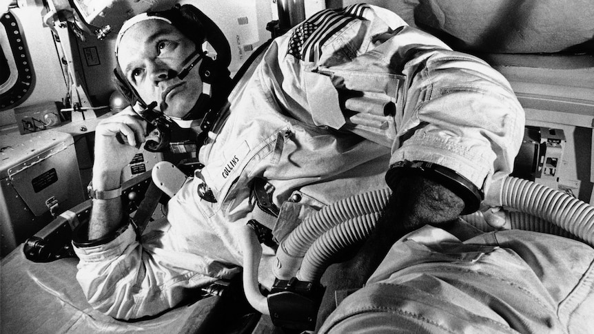 Apollo 11 command module pilot astronaut Michael Collins takes a break during training for the moon mission, in Cape Kennedy.