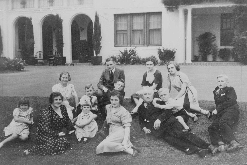 Former Australian Prime Minister Joseph Lyons and Enid Lyons pictured at the Lodge in Canberra with their 11 children.