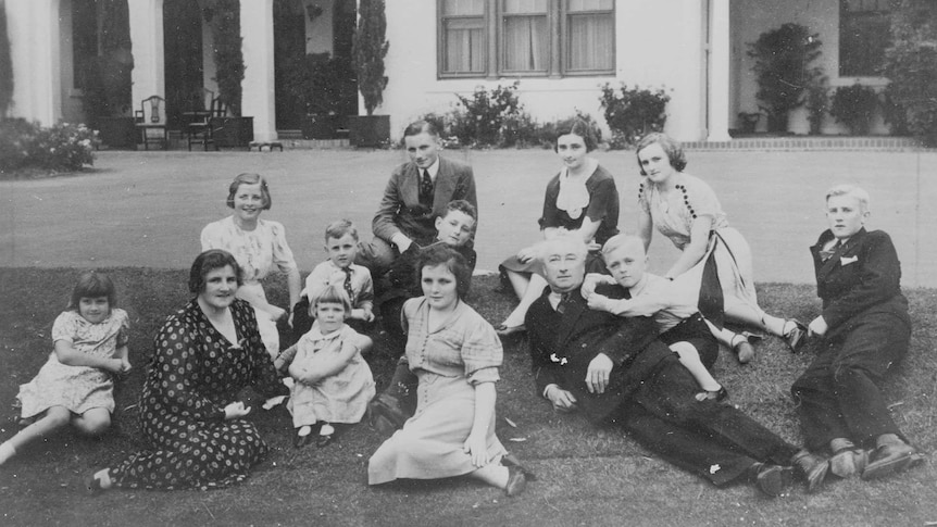 Former Australian Prime Minister Joseph Lyons and Enid Lyons pictured at the Lodge in Canberra with their 11 children.