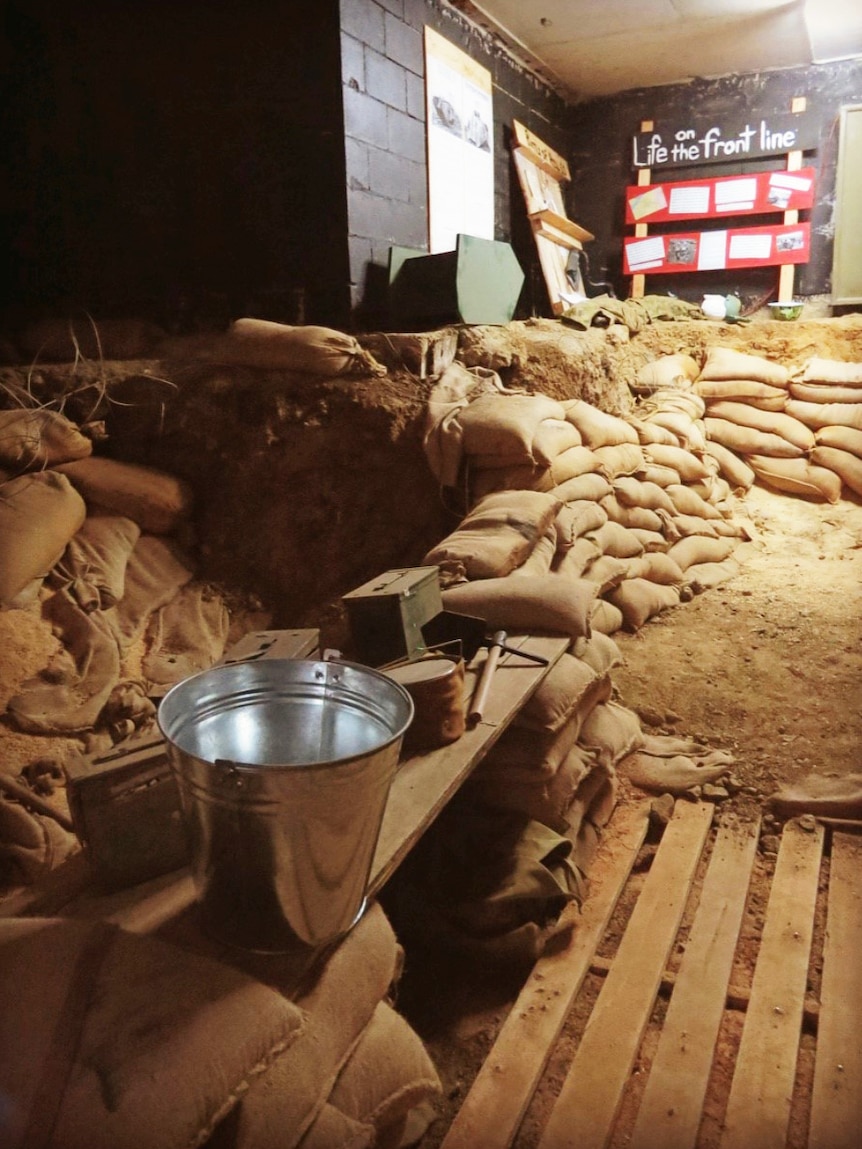 Sandbags of replica WWI trench which has been made from recycled and donated materials.