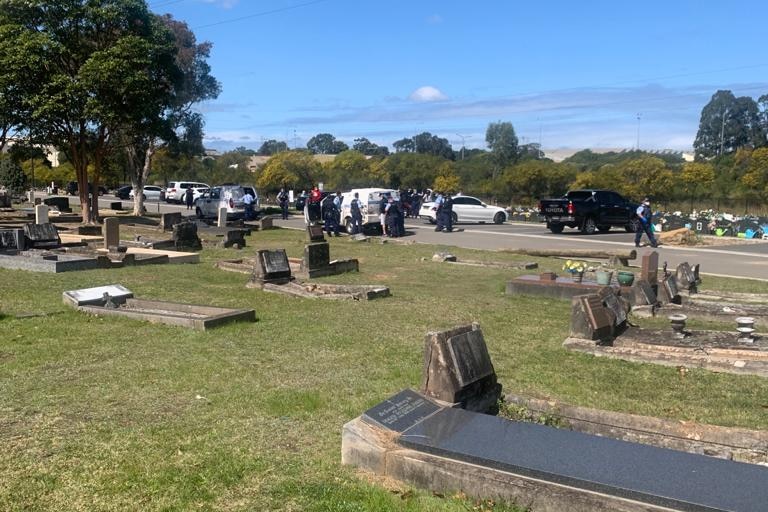 Long distance shotof mourners at Rookwood