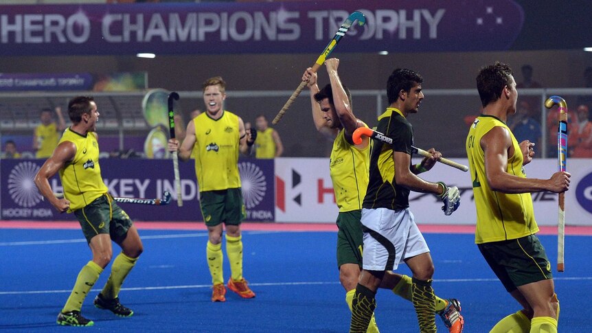The Kookaburras celebrate a goal against Pakistan at the Champions Trophy in India.