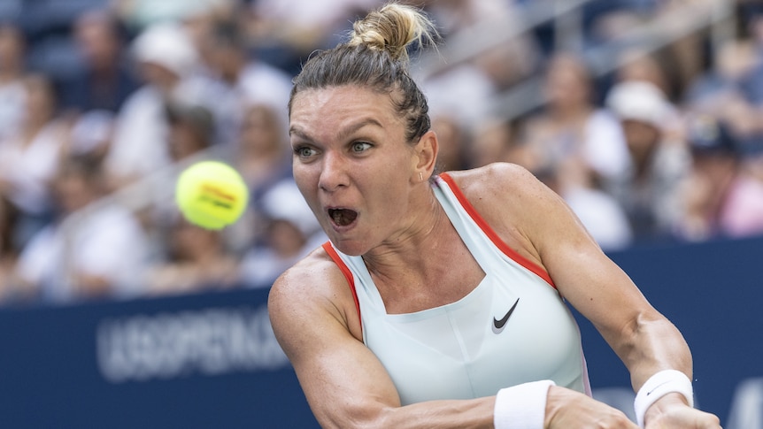 Simona Halep winds up to hit a two-handed backhand at the US Open.