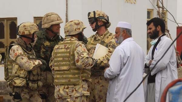 Australian soldiers mix with locals in southern Afghanistan. (ADF)