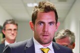 Rubbed out ... Luke Hodge leaves after his AFL tribunal hearing