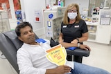 Man donating blood.