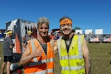 Coach Norbert Petras (left) and blind runner Robin Braidwood smiling after 18 kilometre obstacle course
