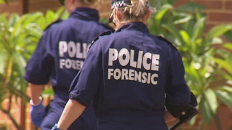 two police forensic officers