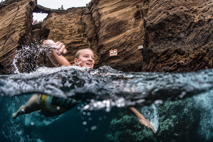 Relief and euphoria greets Australian cliff diver Rhiannan Iffland after the successful completion of a dive in Portugal in 2016