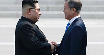 North Korean leader Kim Jong-un's handshake with South Korean leader Moon Jae-in.