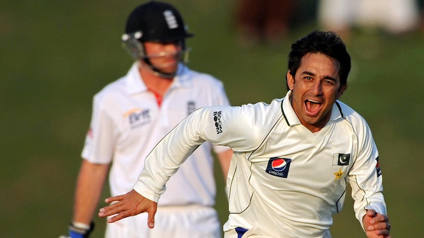 Saeed Ajmal celebrates dismissing Eoin Morgan during the second Test match between Pakistan and England.