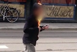 A man sets himself on fire on outside the Oslo courthouse where Anders Behring Breivik is on trial.