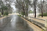 Water over a road in regional Victoria.
