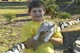 Daniel Morcombe holding a cat