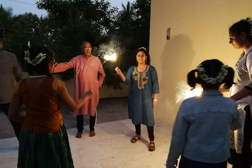 Prabha's daughter Shreya Anand celebrating Diwali with her grandfather and cousins.