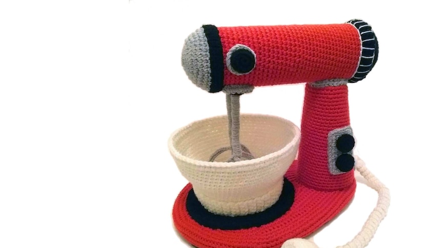 A red crocheted Mix-master.