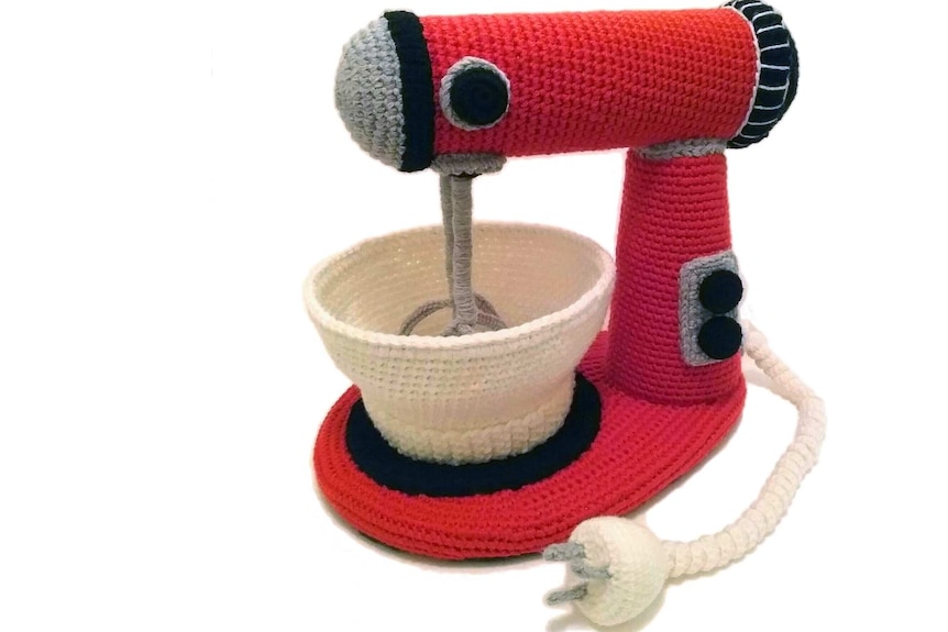 A red crocheted Mix-master.