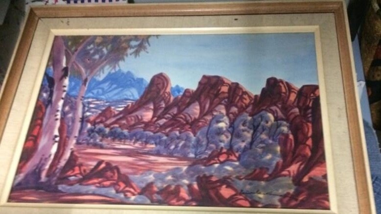 A landscape watercolour painting by Ewald Namatjira, third son of Albert Namatjira