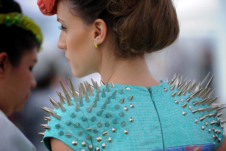 A model waits to appear in Fashions on the Field at Flemington