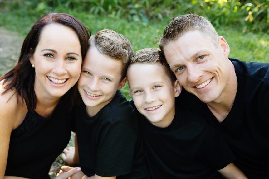 Matthew Model with his wife and two sons