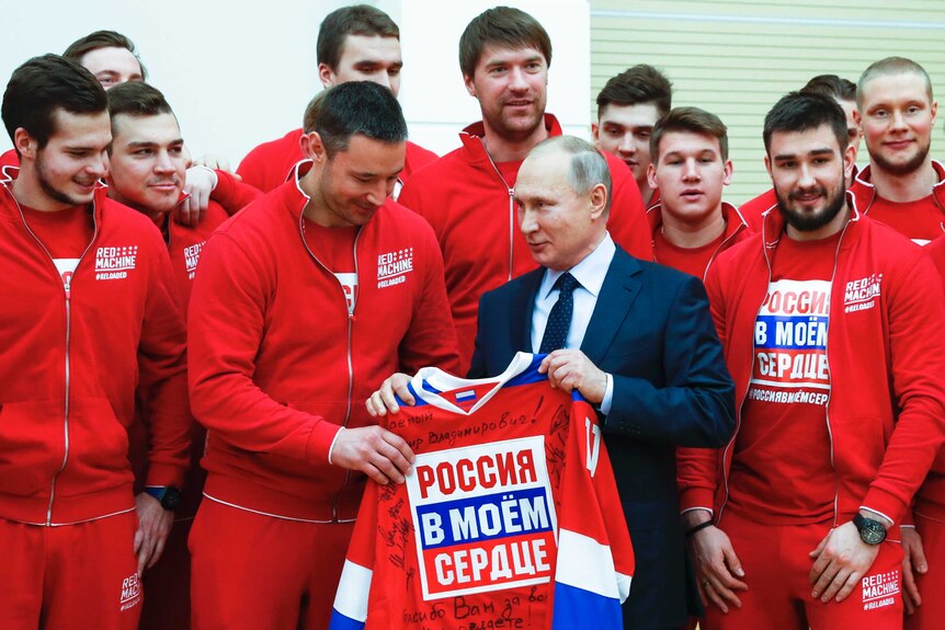 Vladimir Putin meets Russian ice hockey players outside Moscow