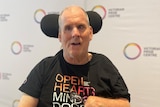 Greg Axtens in his wheelchair.