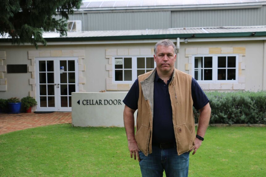 Margaret River Wine Association president Stuart Watson stands in front of a cellar door.