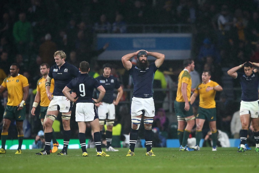 Scotland players look dejected after the quarter-final loss to the Wallabies