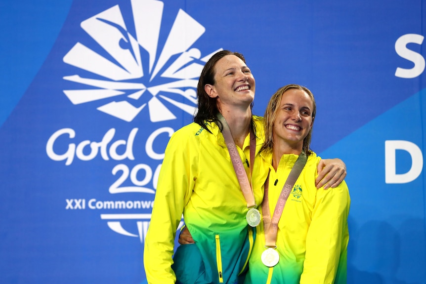 Cate Campbell hugs Bronte Campbell