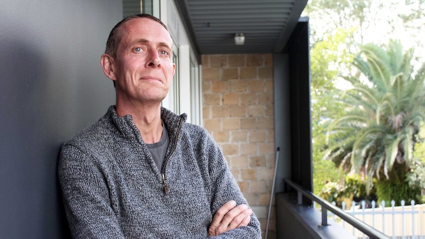 Kiama circus performer Dave Evans with his arms folded.