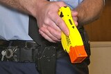 ACT police officers must fill in a report whenever Tasers are drawn from a belt, aimed or fired.